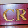 Straight lettering for a farm name.