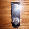 Front latch twists to lock.